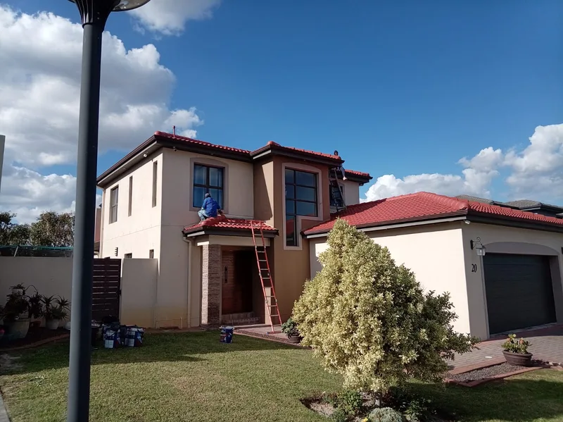 Work in progress exterior and roof painting of a Cape Town home