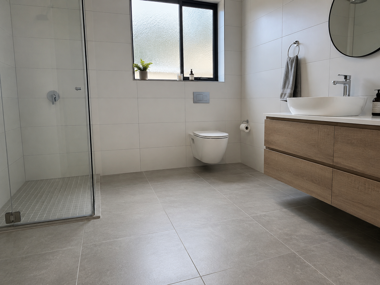 Newly tiled bathroom floor and walls in Cape Town